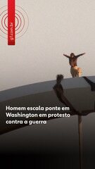 Homem escala ponte em Washington em protesto contra a guerra